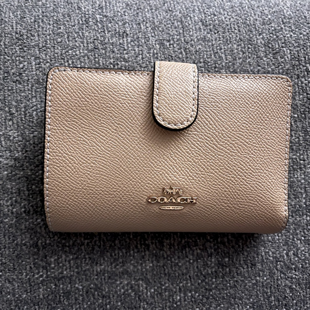 Coach, light pink leather wallet